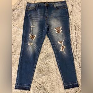 Judy Blue skinny jeans with distressing & cute leopard print detail; size 2XL